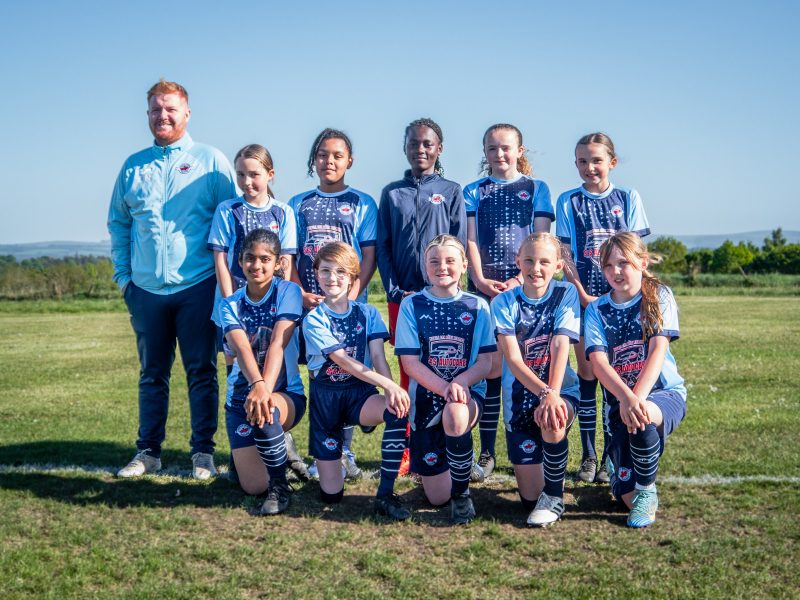LMYFC Girls U12s team with coach
