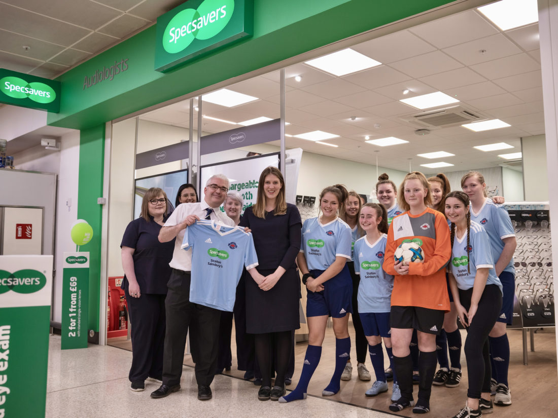 Specsavers Straiton with LMYFC U15 Girls outside shop