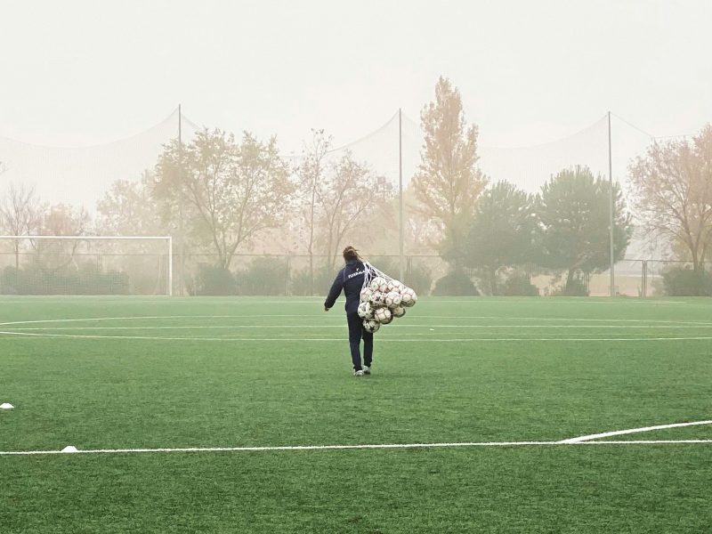 coach with bag of balls